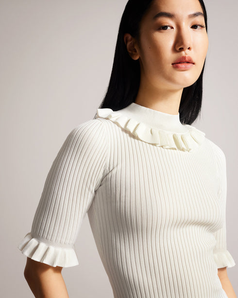 KATELLA-Knitwear-Made of stretchy knit, KATELLA is the perfect statement top to take you from season to season in style. With an oh-so-cute ruffle trim and a super soft feel, this fitted top is sure to become your new go-to. Ted Baker womenswear collection Fitted top Stretch fabric High neck Neck ruffle Ribbed knit Short sleeves with ruffle trim Amy is 5'9.5" / 1.77m and wears Black in a Ted size 1- Ted Baker Romania